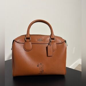 Coach x Peanuts Snoopy Saddle Bag